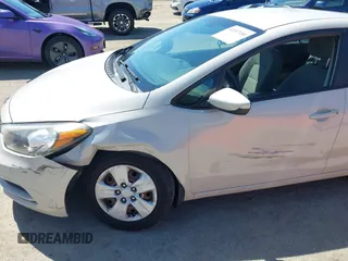 2014 Kia Forte LX with VIN KNAFK4A63E5115830, listed as a IAAI auction lot 42087188 with 111,660 mi miles. Bid and sale history available at carsss.com. Image 12.