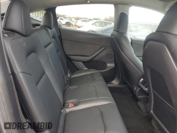 2023 Tesla Model Y Long Range with VIN 7SAYGDEE2PA024693, listed as a Copart auction lot 52595935 with 35,179 mi miles and Salvage Title. Bid and sale history available at DreamBid. Image 10.
