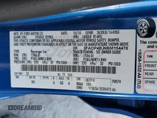 2011 Ford Fiesta SE z VIN 3FADP4BJ9BM154478, wystawiony jako Copart lot #48257645 z przebiegiem 109 717 mil mil oraz Szkoda całkowita • Salvage title. Historia ofert i sprzedaży dostępna na DreamBid. Obrazek 14.