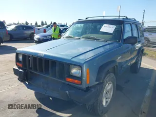 1998 Jeep Cherokee Sport with VIN 1J4FT68S0WL231959, listed as a IAAI auction lot 41680076 with 252,369 mi miles. Bid and sale history available at carsss.com. Image 18.