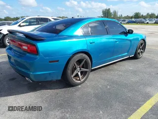 2012 Dodge Charger SXT with VIN 2C3CDXHG0CH185859, listed as a IAAI auction lot 40816799 with 132,572 mi miles. Bid and sale history available at carsss.com. Image 4.