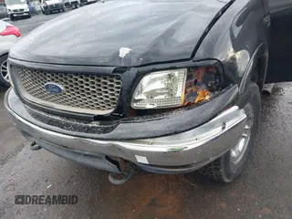 2000 Ford F-150 XL with VIN 1FTRX18W9YNA63551, listed as a IAAI auction lot 41446703 with Not provided miles and . Bid and sale history available at DreamBid. Image 6.