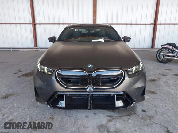 2025 BMW 5 Series with VIN WBS83FK04SCU11874, listed as a IAAI auction lot 42543784 with 4,517 mi miles and . Bid and sale history available at DreamBid. Image 12.