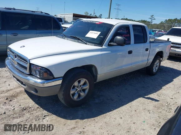 2004 Dodge Dakota SLT with VIN 1D7HL48K54S642754, listed as a IAAI auction lot 41875084 with 242,894 mi miles and . Bid and sale history available at carsss.com. Image 2.