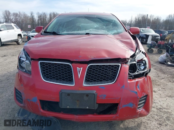 2009 Pontiac Vibe z VIN 5Y2SM67099Z420029, wystawiony jako IAAI lot #41819986 z przebiegiem 140 108 mil mil oraz . Historia ofert i sprzedaży dostępna na DreamBid. Obrazek 13.