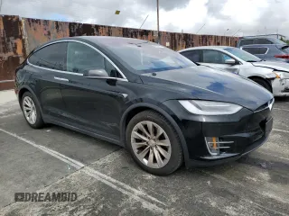 2018 Tesla Model X 75D with VIN 5YJXCBE24JF130216, listed as a Copart auction lot 48894215 with 75,694 mi miles and Salvage Title. Bid and sale history available at carsss.com. Image 4.
