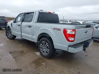 2023 Ford F-150 XL with VIN 1FTEW1C50PKF33143, listed as a IAAI auction lot 41549135 with 9,744 mi miles. Bid and sale history available at carsss.com. Image 3.
