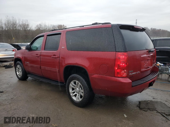 2012 GMC Yukon XL SLT with VIN 1GKS2KE77CR241790, listed as a Copart auction lot 80852344 with 180,827 mi miles and Salvage Title. Bid and sale history available at carsss.com. Image 2.