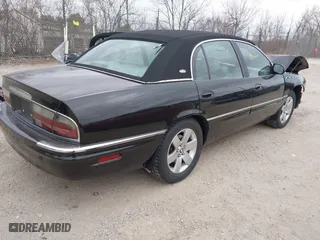 2005 Buick Park Avenue Ultra with VIN 1G4CU541054105442, listed as a IAAI auction lot 42044013 with 138,427 mi miles. Bid and sale history available at carsss.com. Image 4.
