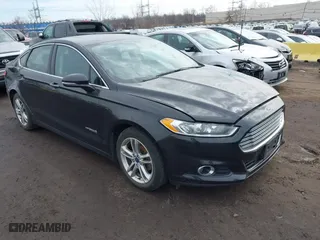 2015 Ford Fusion Titanium Hybrid with VIN 3FA6P0RU6FR299374, listed as a IAAI auction lot 41576007 with 191,285 mi miles. Bid and sale history available at carsss.com. Image 1.