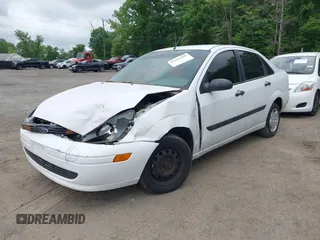 2002 Ford Focus LX with VIN 1FAFP33P42W350981, listed as a IAAI auction lot 42245449 with Not Provided miles and . Bid and sale history available at DreamBid. Image 2.
