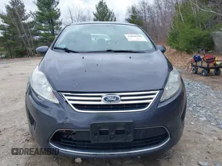 2012 Ford Fiesta SE with VIN 3FADP4BJ3CM152310, listed as a IAAI auction lot 42028398 with 124,530 mi miles and . Bid and sale history available at DreamBid. Image 12.