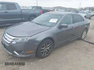2011 Ford Fusion SEL with VIN 3FAHP0JG2BR232778, listed as a IAAI auction lot 42088562 with 186,584 mi miles. Bid and sale history available at carsss.com. Image 2.