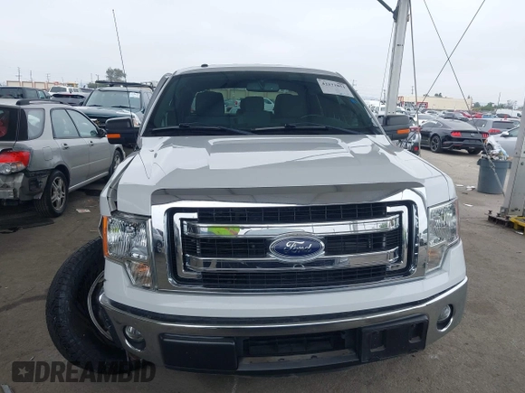 2014 Ford F-150 XL with VIN 1FTFW1CT1EKE22892, listed as a IAAI auction lot 42172851 with 14,203 mi miles and . Bid and sale history available at DreamBid. Image 12.