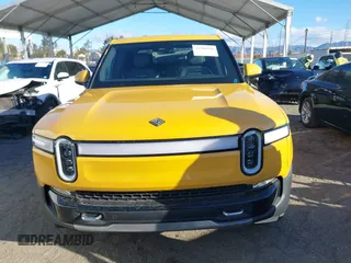 2022 Rivian R1T Adventure Package with VIN 7FCTGAAA2NN005811, listed as a IAAI auction lot 41706558 with 21,336 mi miles. Bid and sale history available at carsss.com. Image 12.