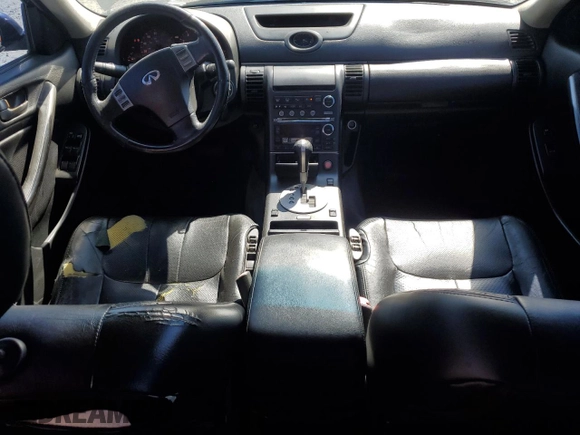 2004 Infiniti G35 w/Leather with VIN JNKCV51F64M710399, listed as a Copart auction lot 50804035 with 186,738 mi miles and Salvage Title. Bid and sale history available at DreamBid. Image 8.