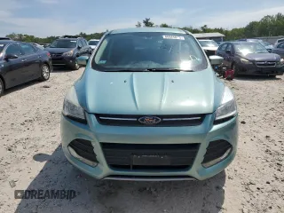 2013 Ford Escape SE z VIN 1FMCU9GX8DUC50864, wystawiony jako Copart lot #66066015 z przebiegiem 80 102 mil mil oraz Czysty tytuł • Clean title. Historia ofert i sprzedaży dostępna na DreamBid. Obrazek 5.