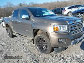 2016 GMC Canyon 4WD SLT with VIN 1GTG6DE35G1224117, listed as a IAAI auction lot 41434660 with 131,825 mi miles. Bid and sale history available at carsss.com. Image 1.
