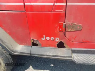 1995 Jeep Wrangler S z VIN 1J4FY19P9SP321158, wystawiony jako IAAI lot #42320918 z przebiegiem 189 918 mil mil oraz . Historia ofert i sprzedaży dostępna na DreamBid. Obrazek 6.