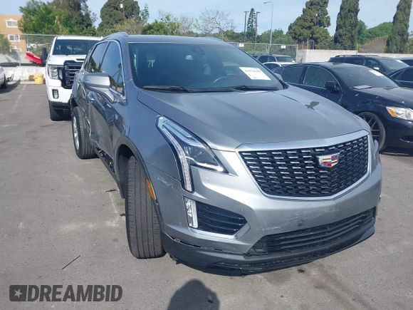 2023 Cadillac XT5 FWD Luxury z VIN 1GYKNAR49PZ137556, wystawiony jako IAAI lot #41934199 z przebiegiem 13 298 mil mil oraz . Historia ofert i sprzedaży dostępna na DreamBid. Obrazek 1.