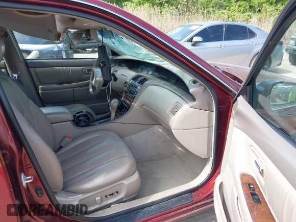 2001 Toyota Avalon XL z VIN 4T1BF28B61U144974, wystawiony jako IAAI lot #42112377 z przebiegiem 168 311 mil mil oraz . Historia ofert i sprzedaży dostępna na DreamBid. Obrazek 5.
