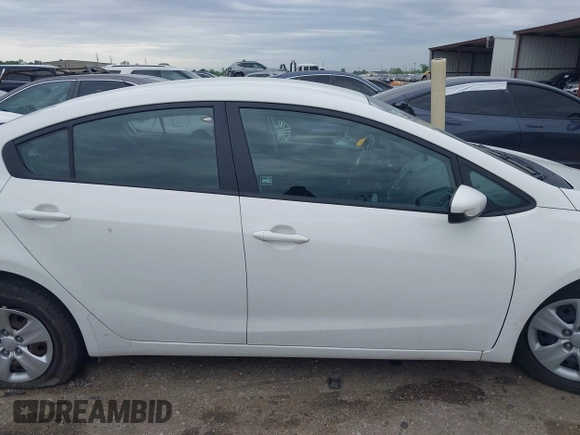 2016 Kia Forte LX z VIN KNAFK4A63G5486330, wystawiony jako IAAI lot #41898559 z przebiegiem 149 606 mil mil oraz . Historia ofert i sprzedaży dostępna na DreamBid. Obrazek 13.