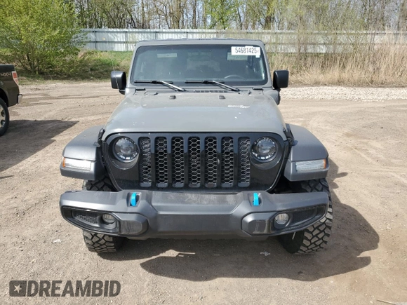 2023 Jeep Wrangler z VIN 1C4JJXN61PW623013, wystawiony jako Copart lot #54681425 z przebiegiem 26 574 mil mil oraz Czysty tytuł • Clean title. Historia ofert i sprzedaży dostępna na DreamBid. Obrazek 5.