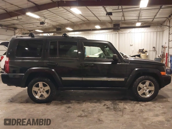 2010 Jeep Commander Sport z VIN 1J4RG4GT4AC115611, wystawiony jako IAAI lot #42286985 z przebiegiem 149 365 mil mil oraz . Historia ofert i sprzedaży dostępna na DreamBid. Obrazek 13.