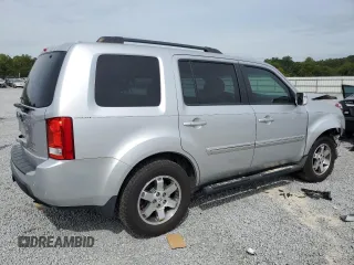 2010 Honda Pilot Touring with VIN 5FNYF3H82AB011212, listed as a Copart auction lot 71115874 with 248,495 mi miles and Salvage Title. Bid and sale history available at DreamBid. Image 3.