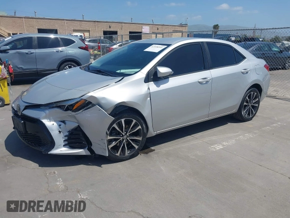 2019 Toyota Corolla L with VIN 5YFBURHE5KP877691, listed as a IAAI auction lot 42108591 with 85,813 mi miles and . Bid and sale history available at DreamBid. Image 18.