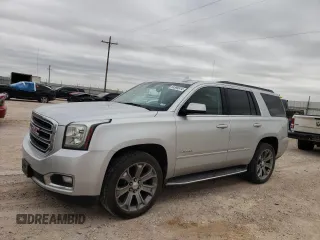 2016 GMC Yukon SLT with VIN 1GKS1BKC1GR284788, listed as a Copart auction lot 54599514 with 151,878 mi miles and Salvage Title. Bid and sale history available at carsss.com. Image 1.