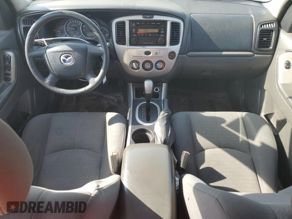 2005 Mazda Tribute i with VIN 4F2YZ02Z95KM24700, listed as a Copart auction lot 42002775 with 128,891 mi miles and Salvage Title. Bid and sale history available at carsss.com. Image 8.