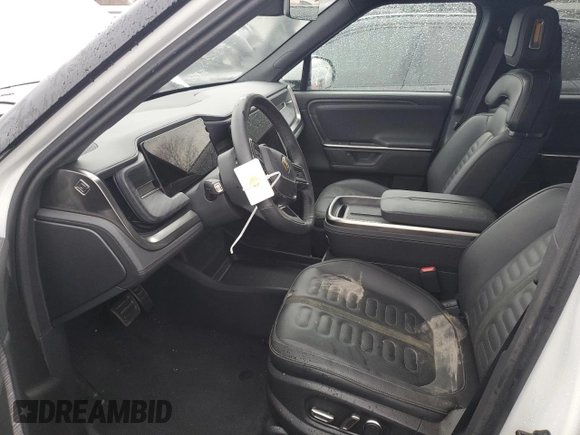 2025 Rivian R1S Adventure z VIN 7PDSGBBA3SN046975, wystawiony jako Copart lot #42880125 z przebiegiem Nie podano mil oraz Szkoda całkowita • Salvage title. Historia ofert i sprzedaży dostępna na DreamBid. Obrazek 7.