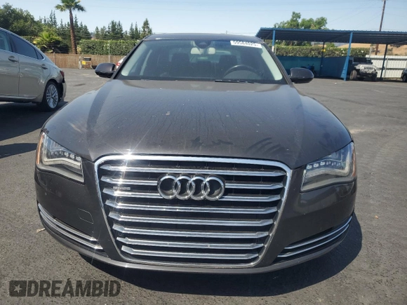 2011 Audi A8 z VIN WAURVAFD0BN005579, wystawiony jako Copart lot #59584025 z przebiegiem 95 704 mil mil oraz Szkoda całkowita • Salvage title. Historia ofert i sprzedaży dostępna na DreamBid. Obrazek 5.