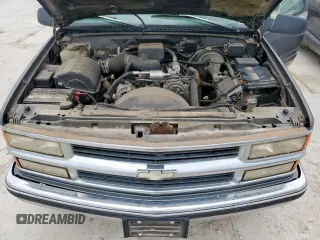 1999 Chevrolet Suburban with VIN 1GBEC16R0XJ434453, listed as a Copart auction lot 54711725 with 179,597 mi miles and Clean title. Bid and sale history available at DreamBid. Image 12.