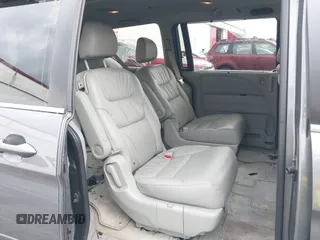2007 Honda Odyssey EX-L z VIN 5FNRL386X7B445642, wystawiony jako IAAI lot #40652844 z przebiegiem 202 622 mil mil oraz . Historia ofert i sprzedaży dostępna na DreamBid. Obrazek 8.
