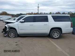 2019 GMC Yukon XL SLT with VIN 1GKS2GKC7KR165419, listed as a IAAI auction lot 40977930 with 167,195 mi miles and . Bid and sale history available at carsss.com. Image 14.