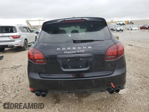 2014 Porsche Cayenne GTS z VIN WP1AD2A2XELA77757, wystawiony jako Copart lot #49527205 z przebiegiem 111 761 mil mil oraz Czysty tytuł • Clean title. Historia ofert i sprzedaży dostępna na DreamBid. Obrazek 6.
