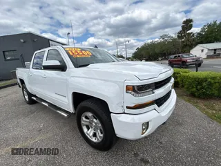 2018 Chevrolet Silverado 1500 LT with VIN 3GCUKREC4JG432719, listed as a Copart auction lot 52822625 with 161,100 mi miles and Clean Title. Bid and sale history available at carsss.com. Image 1.