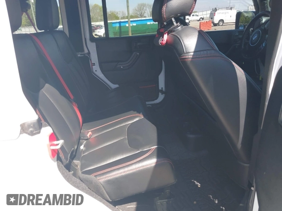 2017 Jeep Wrangler Unlimited Rubicon with VIN 1C4BJWFG9HL695361, listed as a IAAI auction lot 42010655 with 65,536 mi miles and . Bid and sale history available at DreamBid. Image 8.