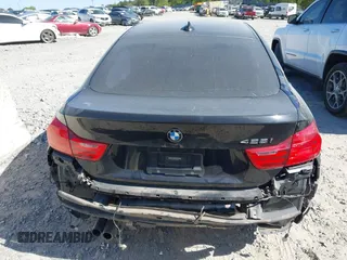 2015 BMW 4 Series 428i with VIN WBA4A5C51FG051393, listed as a IAAI auction lot 42041960 with 136,929 mi miles and . Bid and sale history available at carsss.com. Image 16.