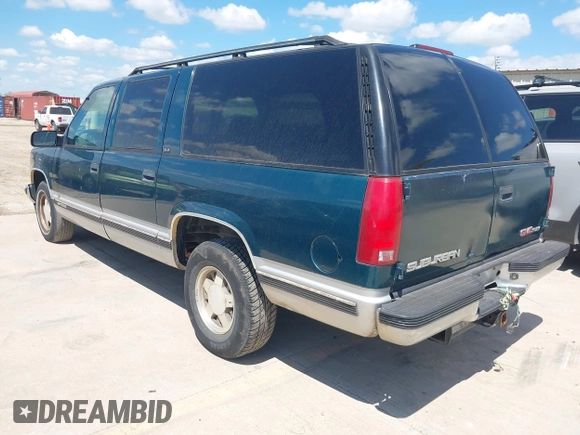 1995 GMC Suburban z VIN 1GKEC16KXSJ712111, wystawiony jako IAAI lot #42185423 z przebiegiem 269 010 mil mil oraz . Historia ofert i sprzedaży dostępna na DreamBid. Obrazek 3.