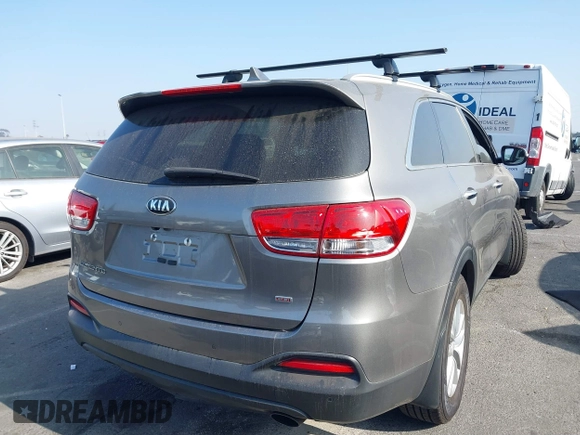 2017 Kia Sorento LX with VIN 5XYPG4A38HG206473, listed as a IAAI auction lot 41135610 with 114,810 mi miles. Bid and sale history available at carsss.com. Image 4.