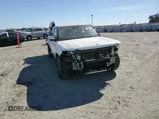 2024 Rivian R1T Adventure z VIN 7FCTGCAA9RN030318, wystawiony jako Copart lot #77036474 z przebiegiem 3 522 mil mil oraz Szkoda całkowita • Salvage title. Historia ofert i sprzedaży dostępna na DreamBid. Obrazek 11.