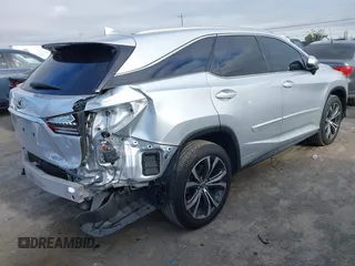 2018 Lexus RX 450hL Premium с VIN JTJDGKCA4J2001622, выставлен на аукционе IAAI как лот 42779010 с пробегом 71 969 миль миль и . История ставок и продаж доступна на DreamBid. Изображение 4.