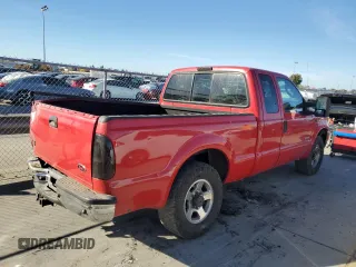 2004 Ford F-250 XL with VIN 1FTNX20P04EB98825, listed as a Copart auction lot 79729074 with 176,099 mi miles and Salvage title. Bid and sale history available at DreamBid. Image 3.