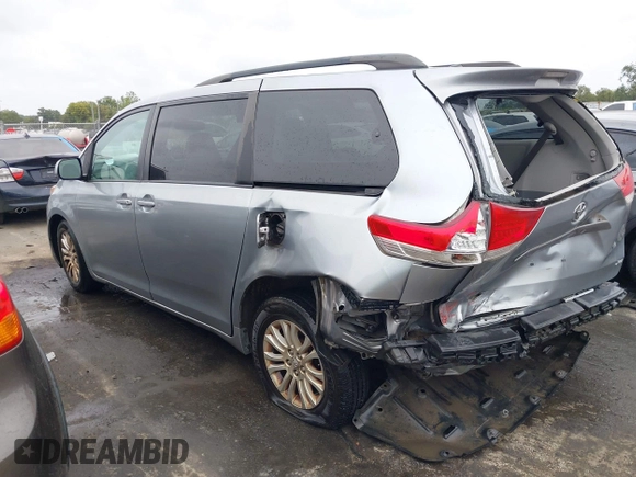 2012 Toyota Sienna XLE AAS with VIN 5TDYK3DC6CS243008, listed as a IAAI auction lot 40351580 with 157,752 mi miles and . Bid and sale history available at DreamBid. Image 14.