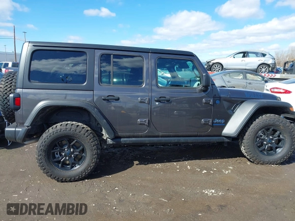 2024 Jeep Wrangler Willys z VIN 1C4RJXN61RW322456, wystawiony jako IAAI lot #41747226 z przebiegiem 2 043 mil mil oraz . Historia ofert i sprzedaży dostępna na DreamBid. Obrazek 13.