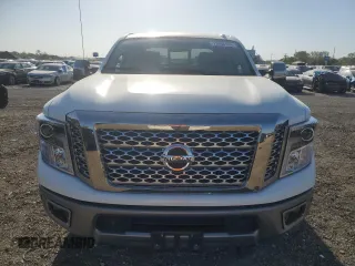 2017 Nissan Titan XD PRO-4X with VIN 1N6BA1F44HN541022, listed as a Copart auction lot 73966134 with 66,582 mi miles and Salvage Title. Bid and sale history available at carsss.com. Image 5.