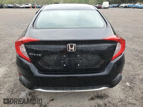 2021 Honda Civic LX z VIN 2HGFC2F6XMH502056, wystawiony jako Copart lot #54393025 z przebiegiem 57 080 mil mil oraz Czysty tytuł • Clean title. Historia ofert i sprzedaży dostępna na DreamBid. Obrazek 6.